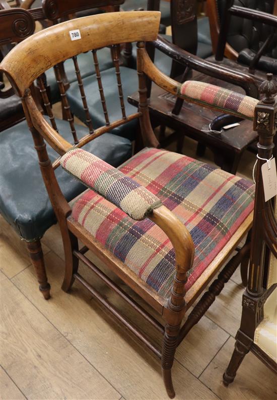 A carver chair with bamboo back slats